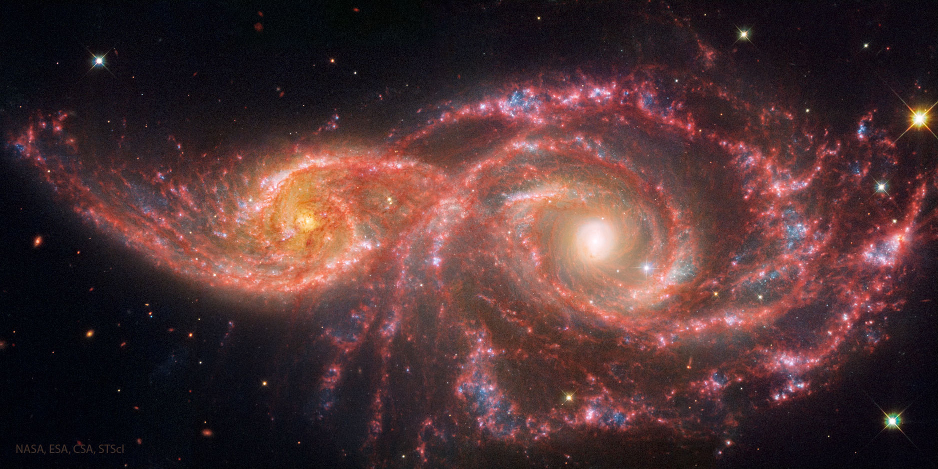 CollidingGalaxies_WebbHubble_1877.jpg